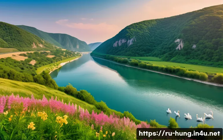 헝가리 도나우 벤드 하이킹 - A panoramic view of the Danube Bend at sunrise, featuring the winding river flowing gently between l...